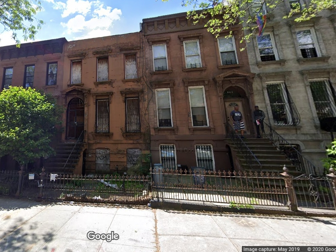 A scammer stole the deed to 260 Clifton Place from an 80-year-old former school teacher, authorities said.