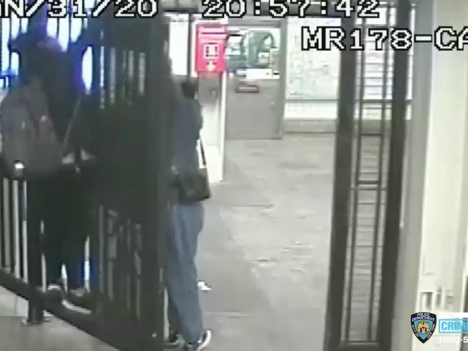 Surveillance video from Jan. 31 shows two people chaining an emergency exit door open at a Bed-Stuy subway station.