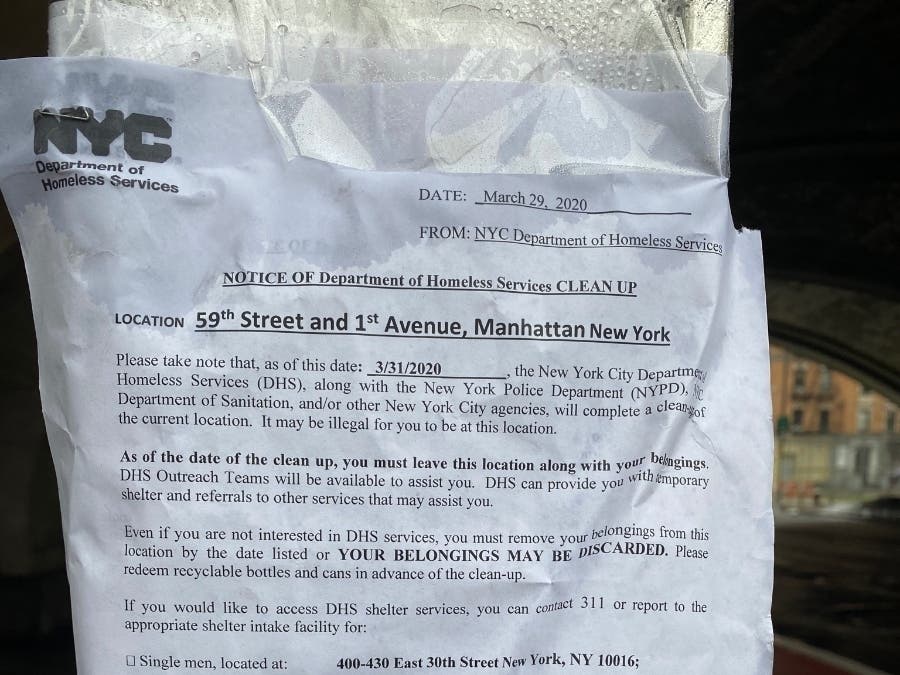 A city notice posted in Manhattan tells homeless people to pack up and move.