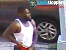 A man seen in police-released video is suspected of shooting and injuring another man inside a Crown Heights home on Saturday, police say.