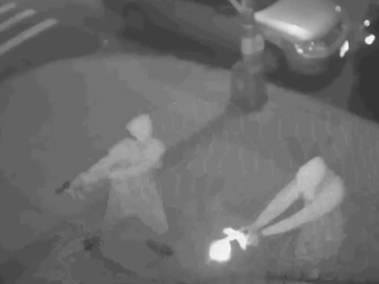 A pair of shooters opened fire on a candlelight vigil along Sterling Street on Monday, according to authorities and reports.