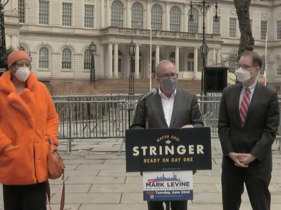 Mayoral candidate Scott Stringer and Mark Levine (right), who's running for Manhattan borough president, jointly called to expand vaccine eligibility for all within 33 hard-hit city neighborhoods.