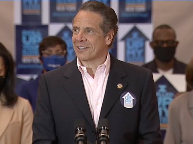Gov. Andrew Cuomo on Monday got loudly corrected by a person in a crowd when he mispronounced "Rochdale Village."