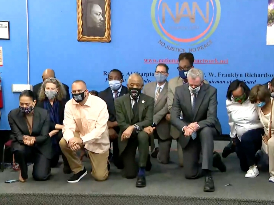 Mayor Bill de Blasio, at right, knelt alongside Rev. Al Sharpton and Rep. Hakeem Jeffries, at left, for 9 minutes and 29 seconds — the span of time Derek Chauvin had his knee on George Floyd's neck.