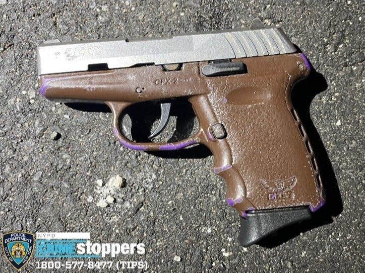 NYPD officials released this photo of a gun they said suspects used to shoot an off-duty cop.