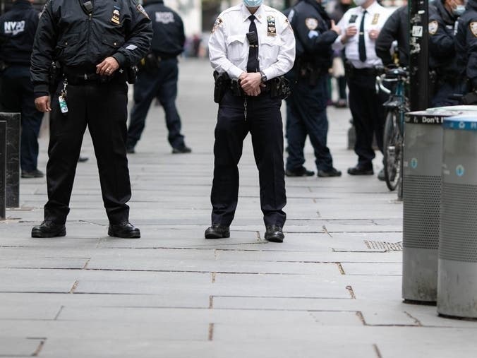 Nine wrongfully convicted New Yorkers on Wednesday sued a pair of corrupt cops and NYPD officials.