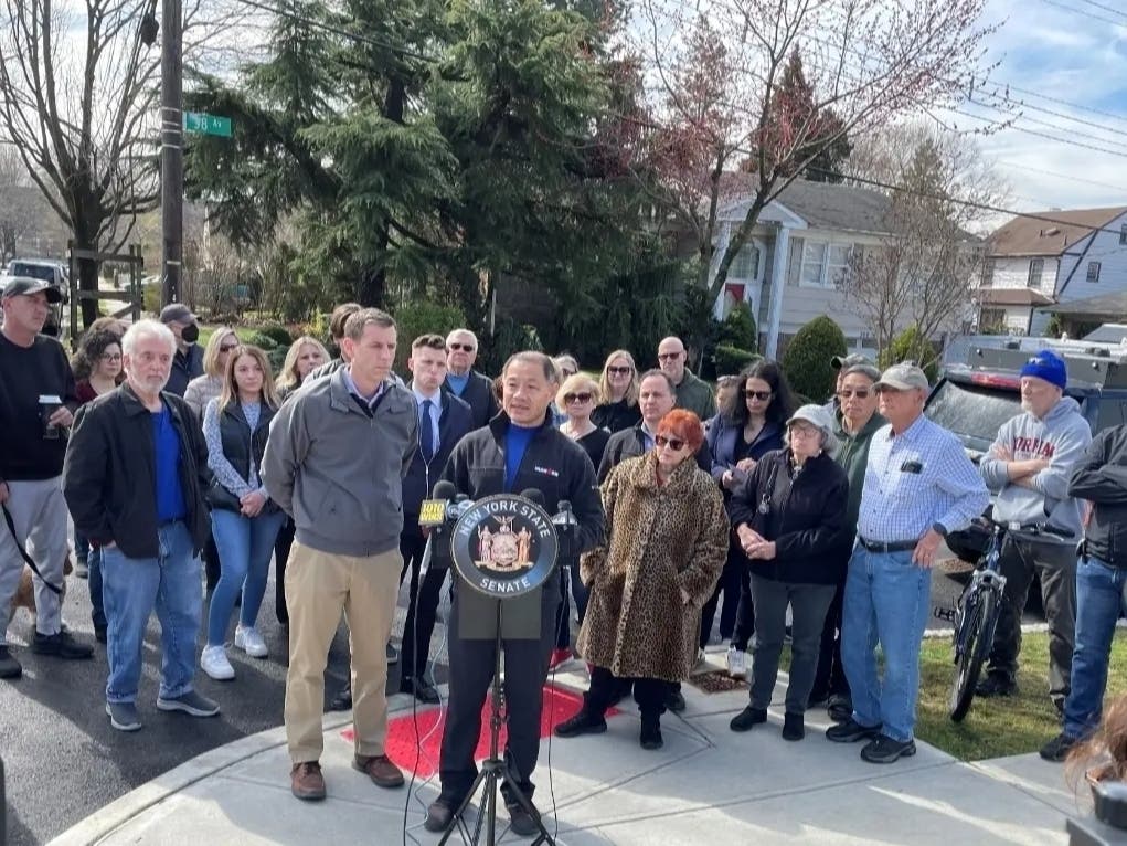 Neighbors and leaders rallied against the people living inside a Bayside home, which they said is being inhabited and rented on Airbnb unlawfully. 