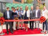 Stamford Mayor Caroline Simmons (center holding scissors) joined principals  of development partners Fields Grade and Alpine Residential and other dignitaries for a ceremonial ribbon cutting to mark  the arrival of The Hazel Stamford