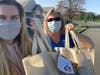 Samaritan Nurse Traci Minard (right) and daughter and Samaritan Volunteer Jessica Minard deliver Thanksgiving meals to a patient’s house.