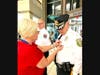 A member of the Voorhees Police Department receives a First Responders’ pin from Sharon Wenner of Samaritan.