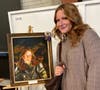 Haddon Heights Jr. Sr. High School student Collette Ayscue poses with her self-portrait, which won a first place ribbon at the Tri-State DisAbility Art Show.