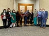 LivingWell Cancer Resource Center and Northwestern Medicine oncology staff celebrate the grand opening of a second location in Warrenville with a ribbon cutting supported by the Western DuPage Chamber of Commerce.  
