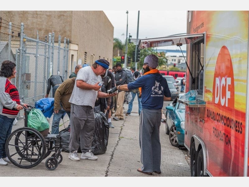 The Duwara Consciousness Foundation gives out free meals to homeless residents in downtown during the coronavirus pandemic. 