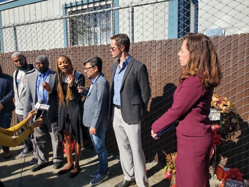 Activists and San Diego City Attorney Mara Elliott got into an impromptu debate over the city’s smart streetlight program. / Photo by Jesse Marx