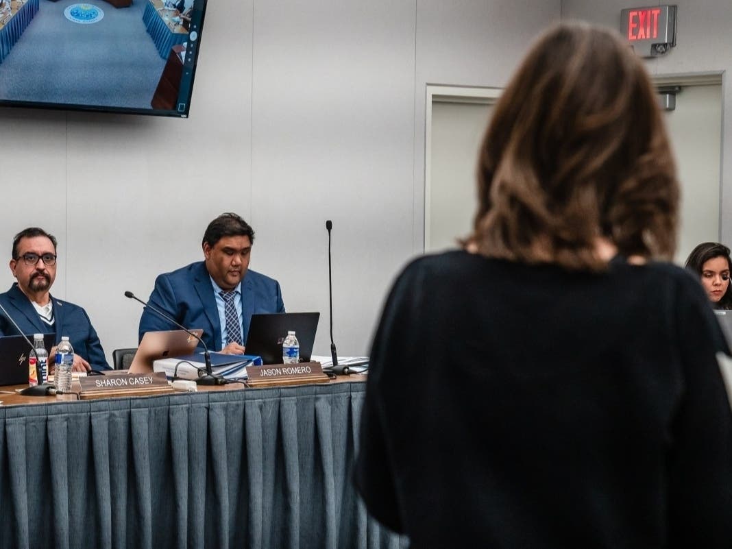 Photo from February 2025 of Jason Romero (left), assistant superintendent for human resources during the Chula Vista Elementary School District board meeting. 