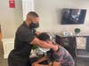 Brook receiving a massage. 