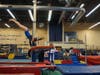 Lana Schmidt flips to success at the Next Dimension gym in Trumbull.
