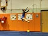 Lucy Collins does a graceful leap during her floor routine. Note: All photos were taken at the Greenwich meet.