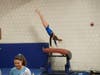 Abby Kissko goes vertical on vault.