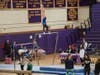 Olivia Perkins swoops circles around the competition on bars.