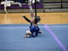 Lauren Grandon displays her flexibility on floor.