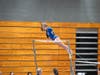 Mia MacDonald scores a personal best on bars.