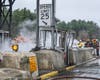 EV Vehicle Crashes Into Bedford Toll Plaza Bursting Into Flames