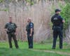 Law enforcement using drones, K9s, and multiple officers searched heavily wooded areas around Mallard Dr and Joey Rd in Merrimack.