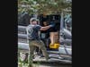 Law enforcement spent most of Wednesday at a residence on Flagg Road executing a search warrant and gathering items in evidence bags.