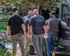 Law enforcement spent most of Wednesday at a residence on Flagg Road executing a search warrant and gathering items in evidence bags.
