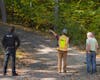Bedford Police, Fire, and OSHA responded to Maiden Lane after a report that a worker was run over by a paving roller Monday morning.