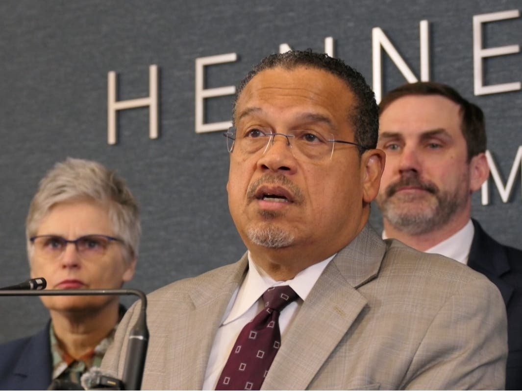 Minnesota Attorney General Keith Ellison announces a lawsuit with Hennepin County Attorney Mary Moriarty on March 24, 2026 against the Trump administration seeking evidence in the shootings of three people by federal immigration agents.