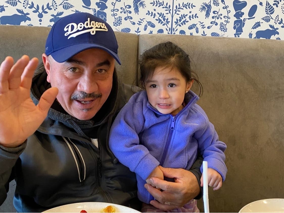 Roberto Hernandez with one of his four grandchildren. The 62-year-old father of a Minneapolis police officer has been in immigration detention since Jan. 5, 2026. 