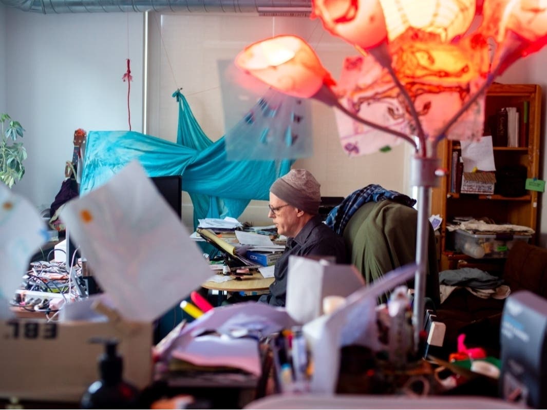 Brently Davis, surrounded by his art and other projects, talks about his experiences with state-run disability services in the apartment he is soon to be evicted from Thursday, Jan. 29, 2026.