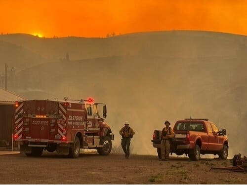 As fires spread rapidly across the Pacific Northwest this summer, wildfire veterans say extreme conditions and aggressive fire suppression could put crews in danger. 
