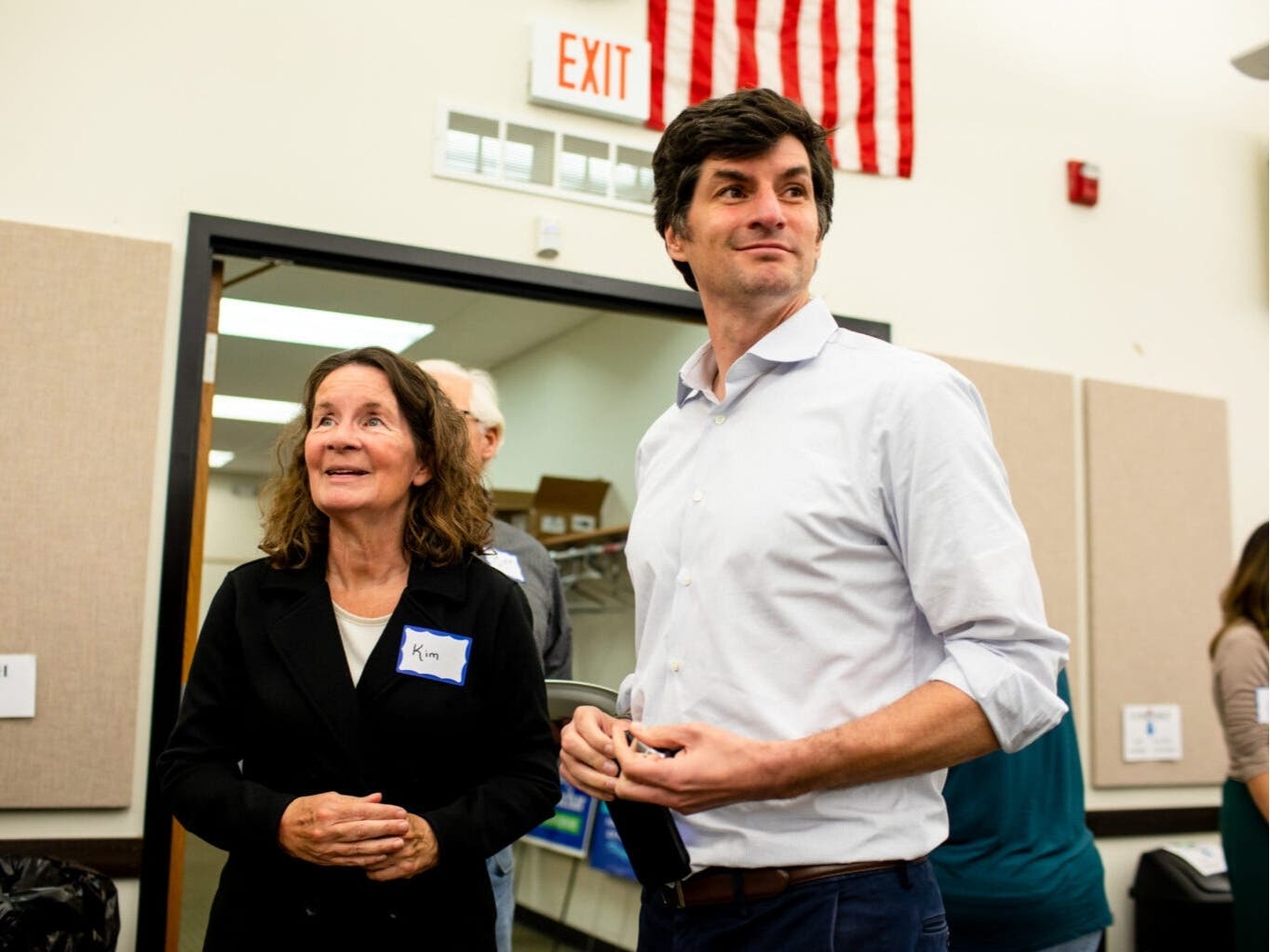 Matt Little, Democratic candidate for Minnesota’s 2nd congressional district, stands with his mother as he talks to supporters at a fundraising event at New Market Township Hall in Lakeville, Minnesota Thursday, Oct. 8, 2026. 