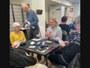 Frank Crocker, Bridge instructor, helping students learn the game of bridge. 