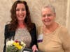 Kristin Chapin (left) of the Bucks County YWCA received her Women Helping Women award from SIIR Past-President Marlene Piasecki.