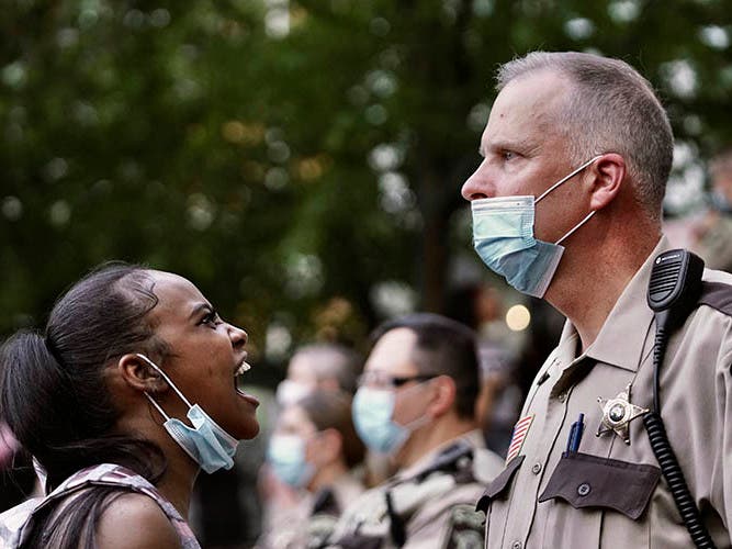 "Not only have we made little progress in the last 50 years, in many ways, things are worse," said a Berkeley expert who studied criminal justice and race. (AP photo by Mark Vancleave)