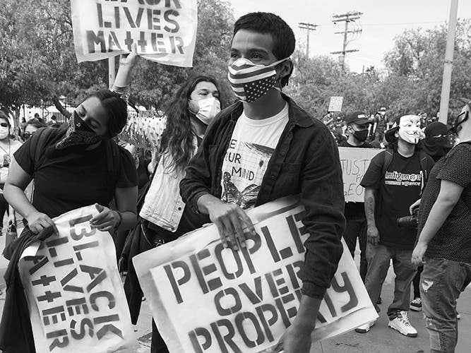People protest for racial justice in Los Angeles, California. (Photo by Mike Von via Unsplash)