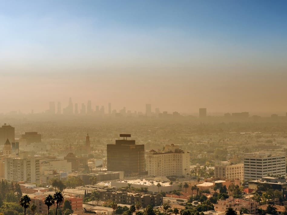 A 2015 photo shows air pollution over Los Angeles at sunset 