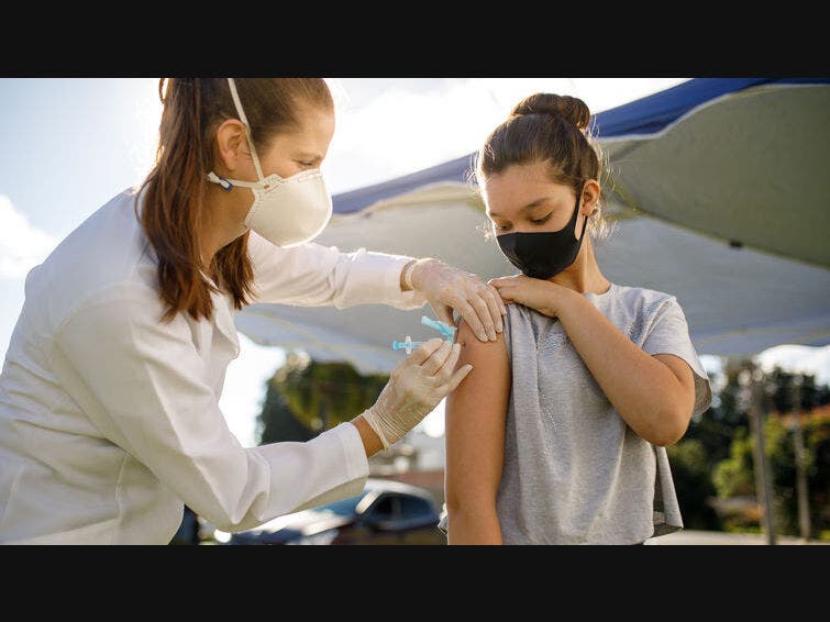 Pediatrician Dr. Alexandra Clark answers questions about vaccine safety in adolescents, side effects, and more.