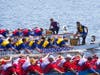 Dragon boats are 40 feet long and weigh about 2250 kg fully loaded with 20 paddlers, a drummer, and a steerer.