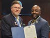 Colonel William Grayson Chapter (SAR) President Andrew Mills (L) received Proclamation from Mayor Derrick R. Wood