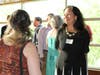 Theresa Rosen, CFP, CLTC greets clients at dinner celebrating Prudence Financial, Inc.'s 36 years in business.