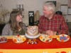 Allie Smith (left) and Al Spoler look at a display of cookies and cakes.
