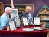 Appraiser Allan Stypeck (camera right) evaluates a collection of NASA photographs and memorabilia valued at $250,000 during a previous episode of Chesapeake Collectibles. (Collector's name unavailable.)
