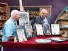 During a previous episode of Chesapeake Collectibles, appraiser Allan Stypeck (camera right) evaluates a collection of NASA photographs and memorabilia valued at $250,000. (Collector's name is unavailable)
