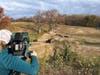 MPT videographer Danielle Crone records free-range cattle grazing at Liberty Delight Farms in Reisterstown.