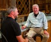 Al Spoler (right) sits with third-generation winemaker Phineas Deford to enjoy a taste of wine from Boordy's special 80th Anniversary Reserve Collection.